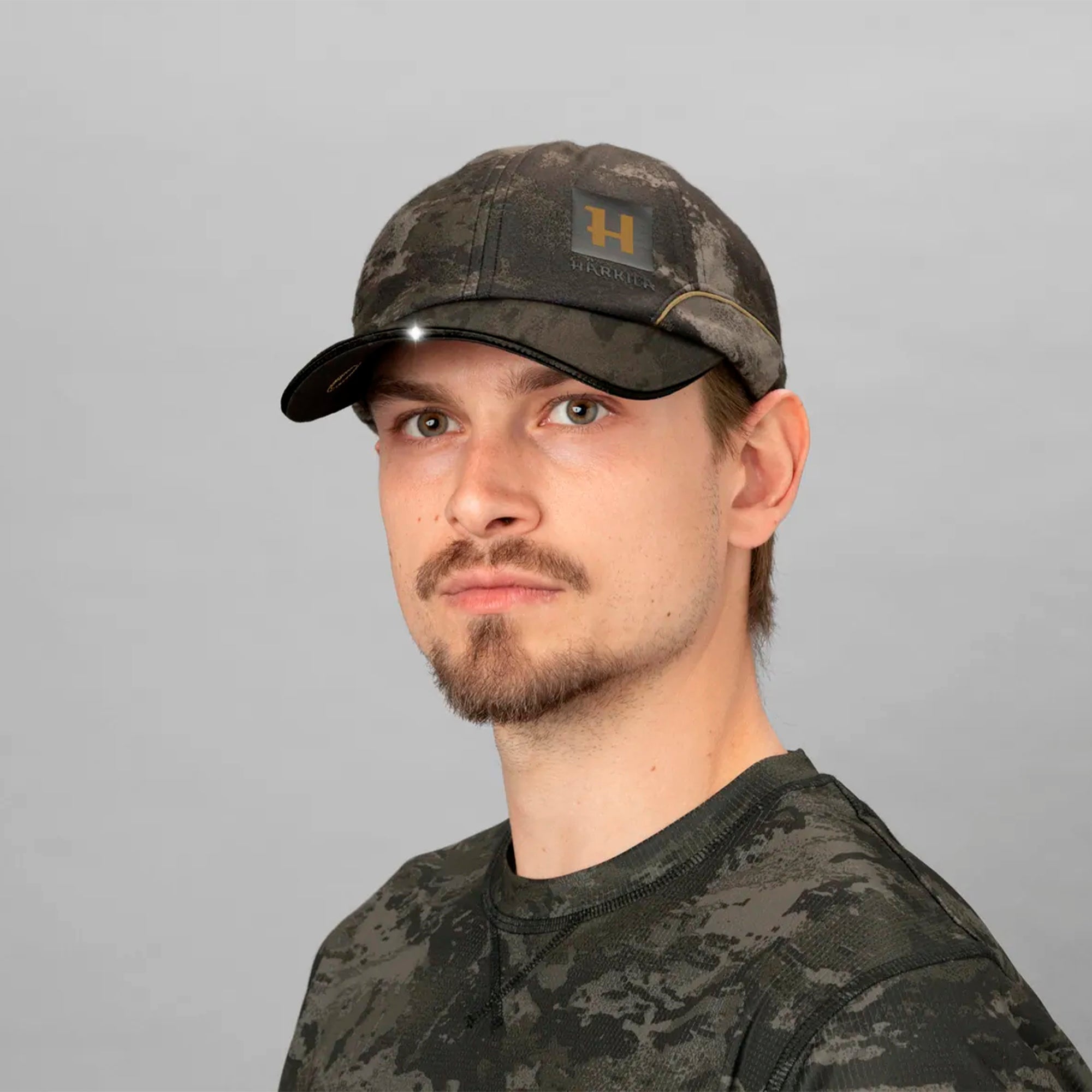 Gorra con luz LED Härkila Noctyx Camo Light